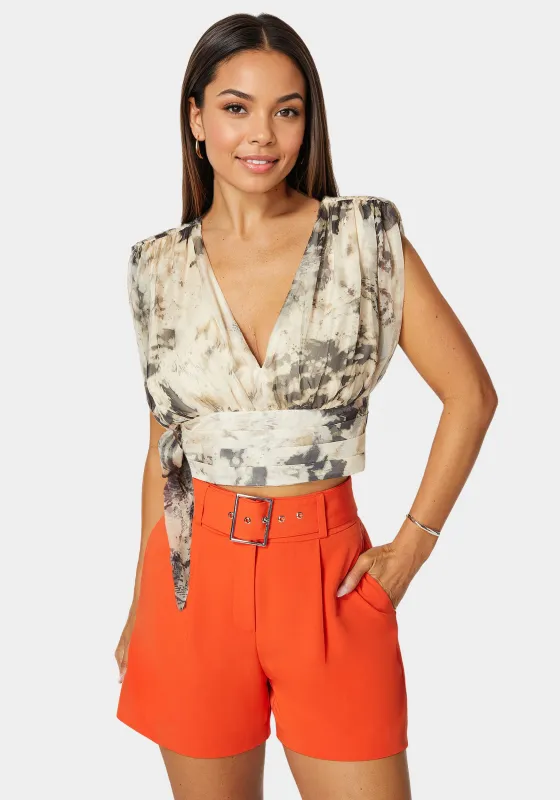 Sleeveless Tie Wrap Blouse sold by Bebe