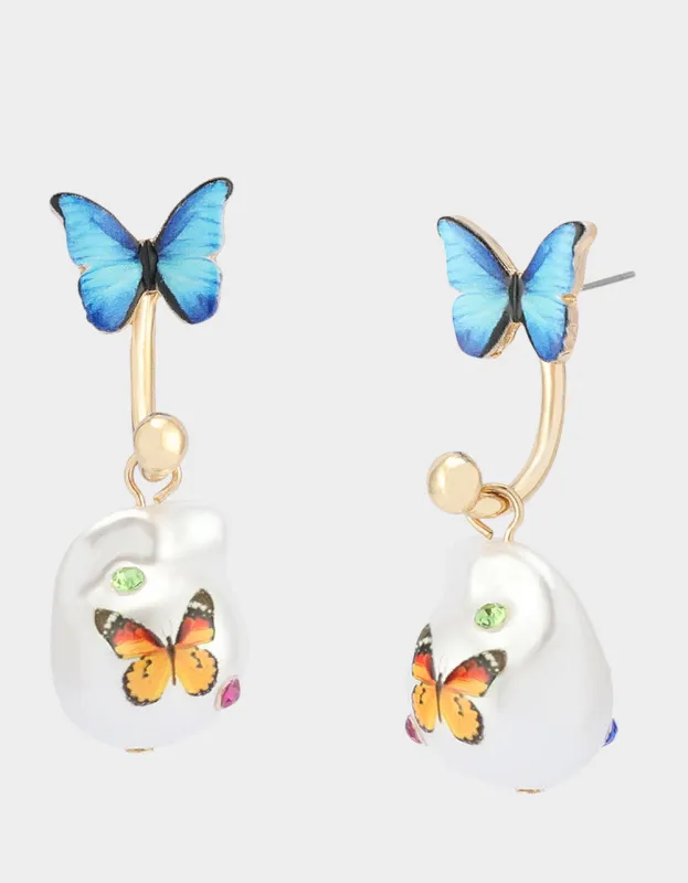 BETSEYS BACKYARD BUTTERFLY PEARL BARBELL EARRINGS BLUE sold by Betsey Johnson