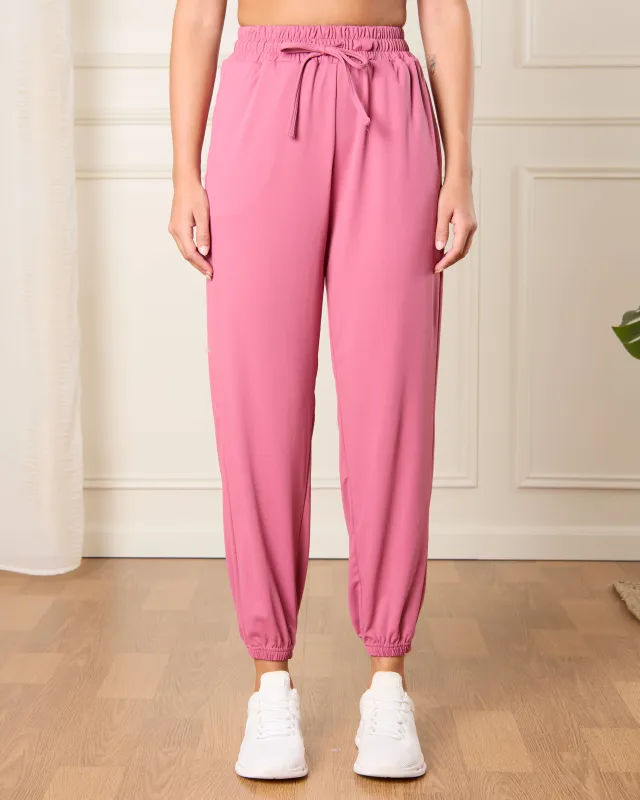 Women Pink Solid Active Legging sold by Redtag