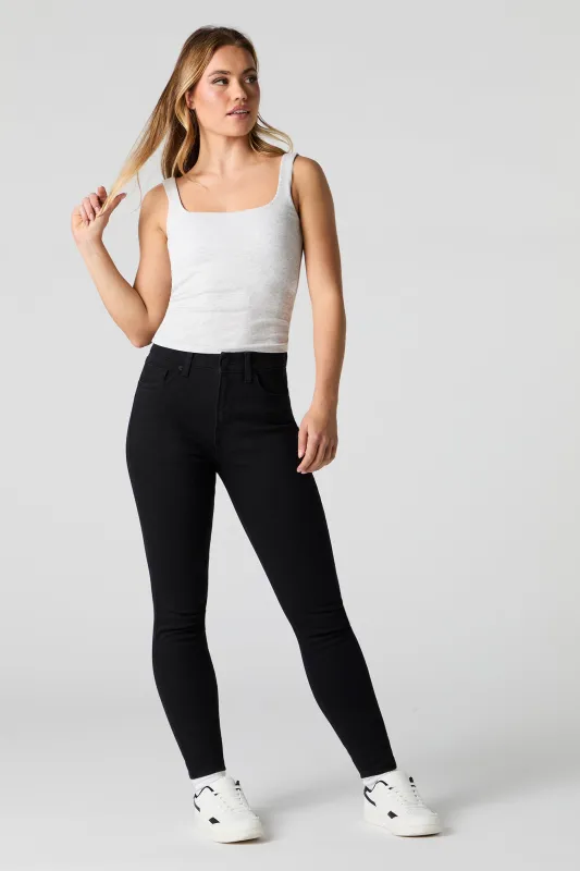 Jean ajusté extensible taille haute noir sold by Urban Planet