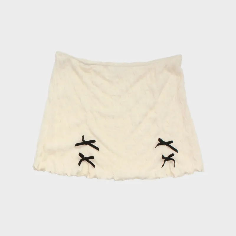 Second Skin Ross Mesh Bow Mini Skirt With Black Bow - Off White sold by Kith
