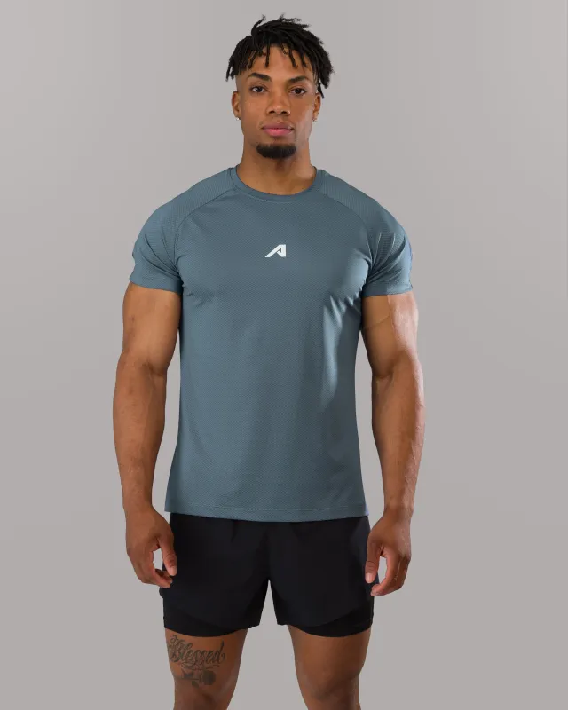 Base Tee - Storm Blue sold by Alphalete