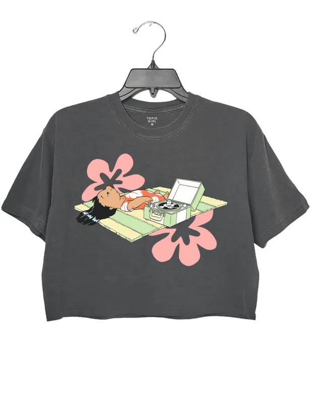 Lilo Relaxing On Beach Mat With Record Player sold by Topic Girl