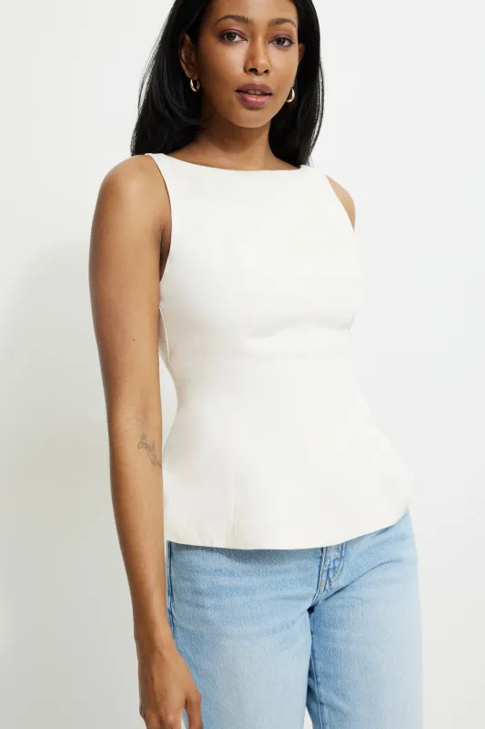 Low Back Peplum Top sold by Dynamite