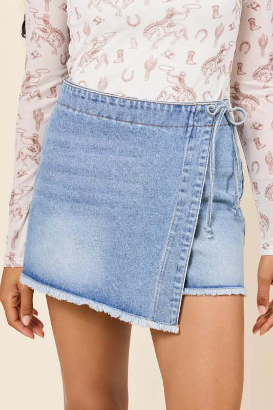 Stacy Light Wash Tie Denim Skort sold by Pink Lily