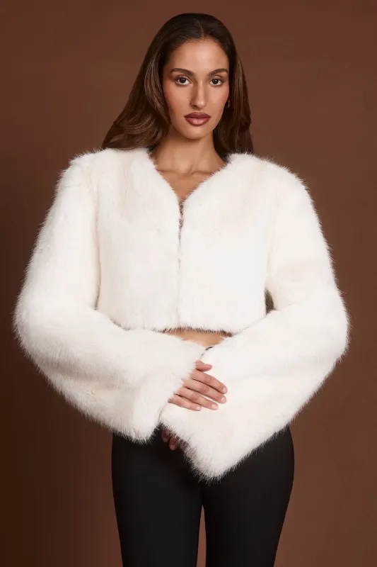 Faux Fur Cropped Bolero in White sold by Oh Polly